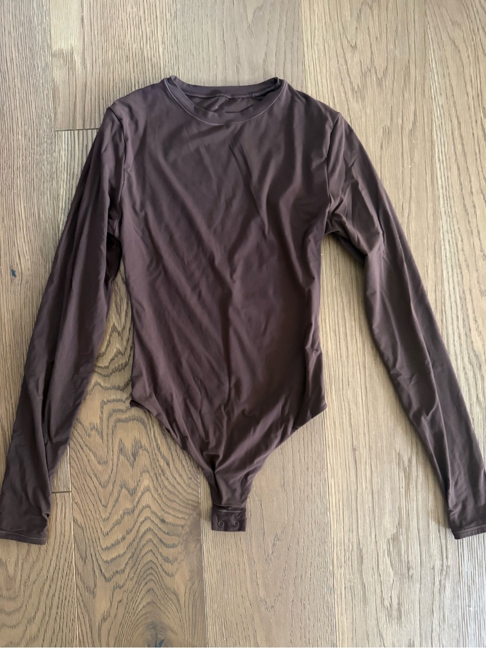 SKIMS Long-Sleeve Scoop Neck Bodysuit in Dark Brown